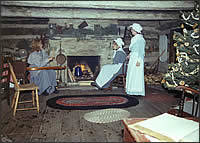 Hearth in log cabin with Christmas decor